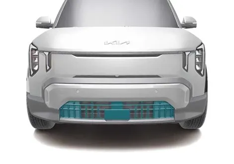 Active Air Flap system mechanism located beneath the front bumper of the Kia EV2