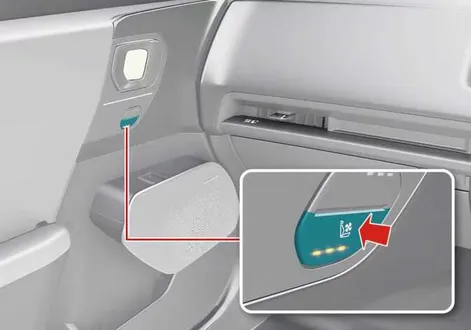 Front passenger air ventilation seat switch and perforated upholstery layout in the Kia EV2