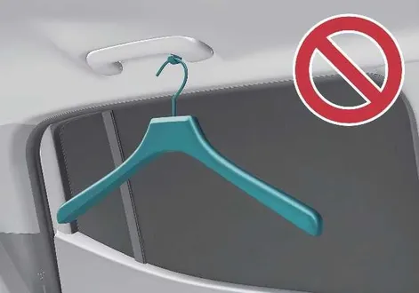 Close-up view of the rear cabin coat hook installation area in the Kia EV2 interior