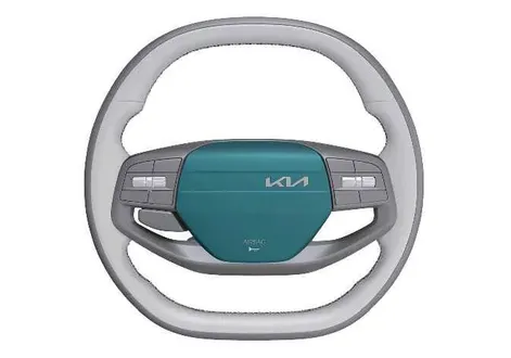 Kia EV2 steering wheel center pad indicating the horn activation area