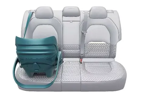 Kia EV2 rearward-facing child safety seat installed securely on the rear passenger bench