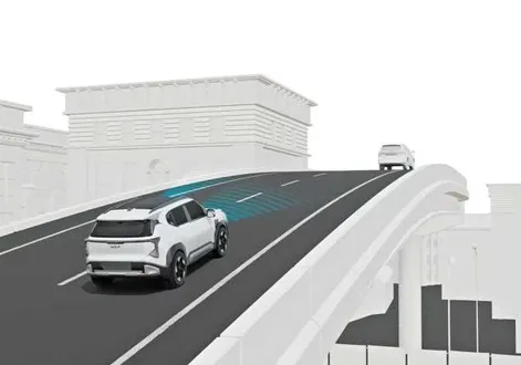 Kia EV2 driving on an uphill or downhill sloped road section