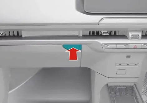 Glove box compartment open inside the passenger dashboard of the Kia EV2